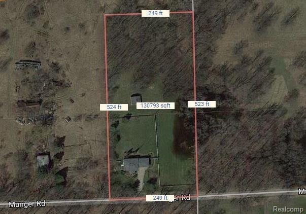 500 Munger Road Holly, MI 48442 - Photo 12 of 15 Arial view. Lots of open space. Property has a small pond on the right and woods in the back.