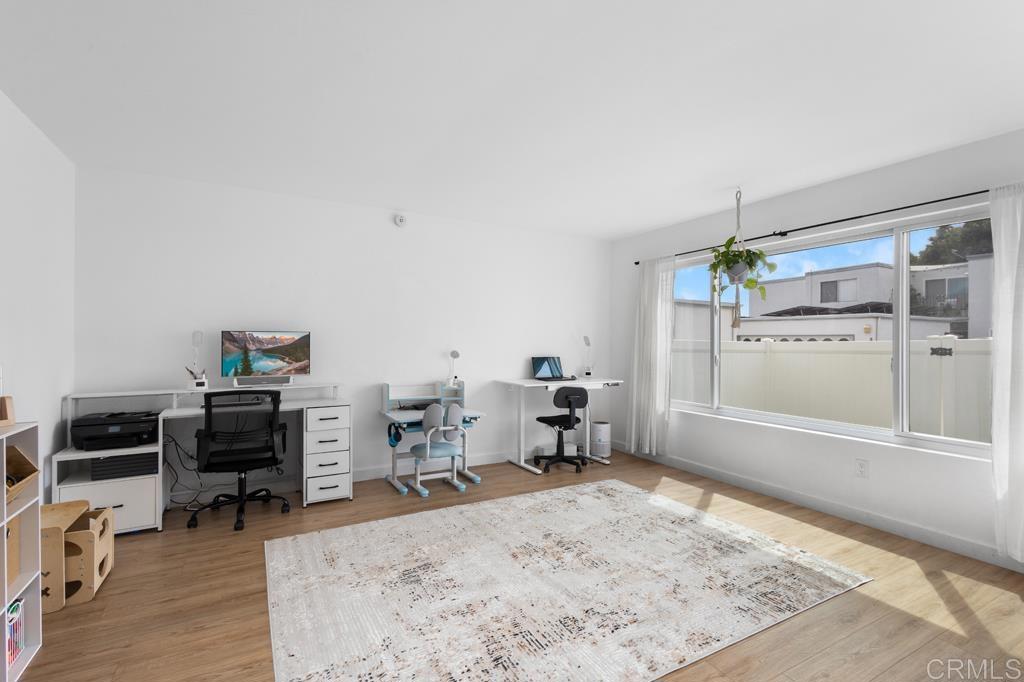 1640 Maple Drive, Unit 53 Chula Vista, CA 91911 - Photo 13 of 52 a living room with furniture and a flat screen tv