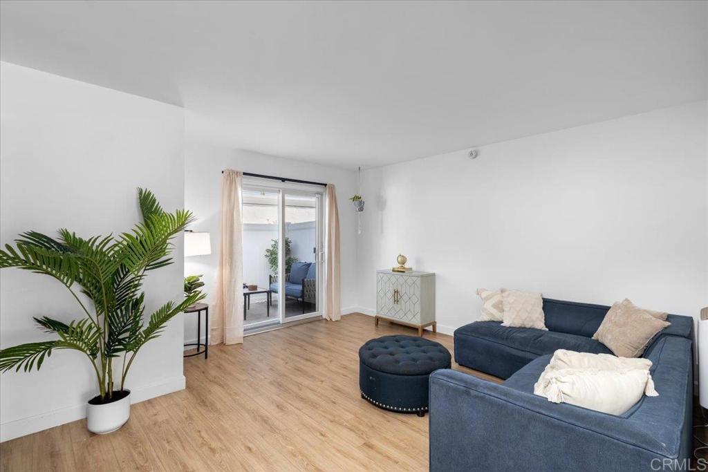 1640 Maple Drive, Unit 53 Chula Vista, CA 91911 - Photo 2 of 52 a living room with furniture and a potted plant