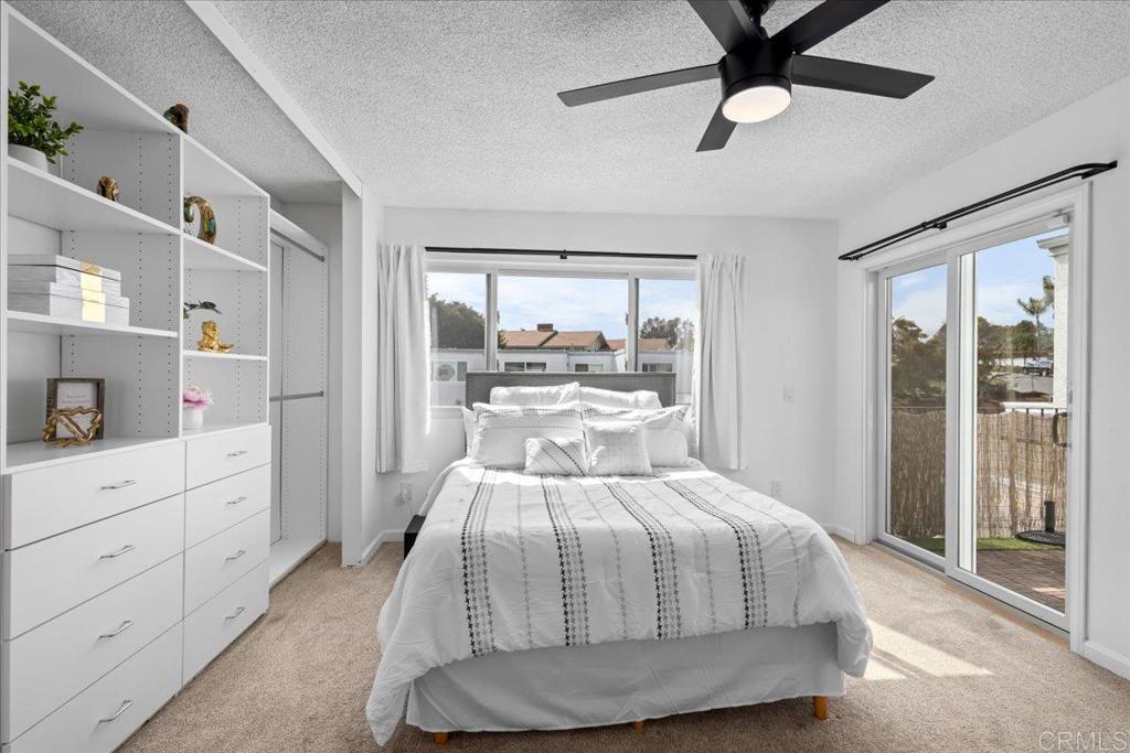 1640 Maple Drive, Unit 53 Chula Vista, CA 91911 - Photo 23 of 52 a bedroom with a large bed and a window