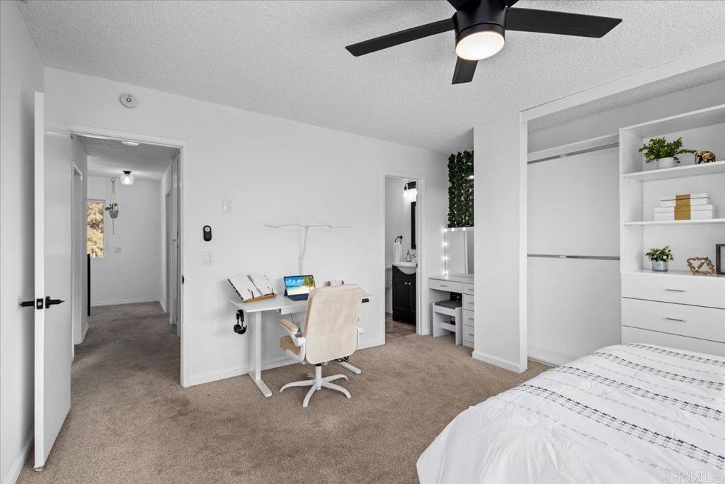 1640 Maple Drive, Unit 53 Chula Vista, CA 91911 - Photo 25 of 52 a view of a workspace with furniture and a kitchen
