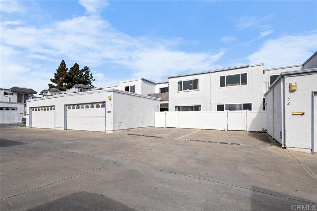 1640 Maple Drive, Unit 53 Chula Vista, CA 91911 - Photo 39 of 52 a view of white house with a yard