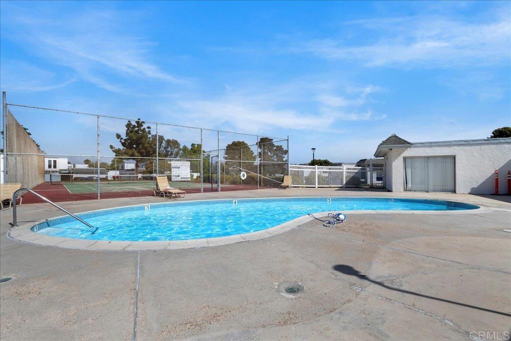 1640 Maple Drive, Unit 53 Chula Vista, CA 91911 - Photo 41 of 52 a house view with a swimming pool