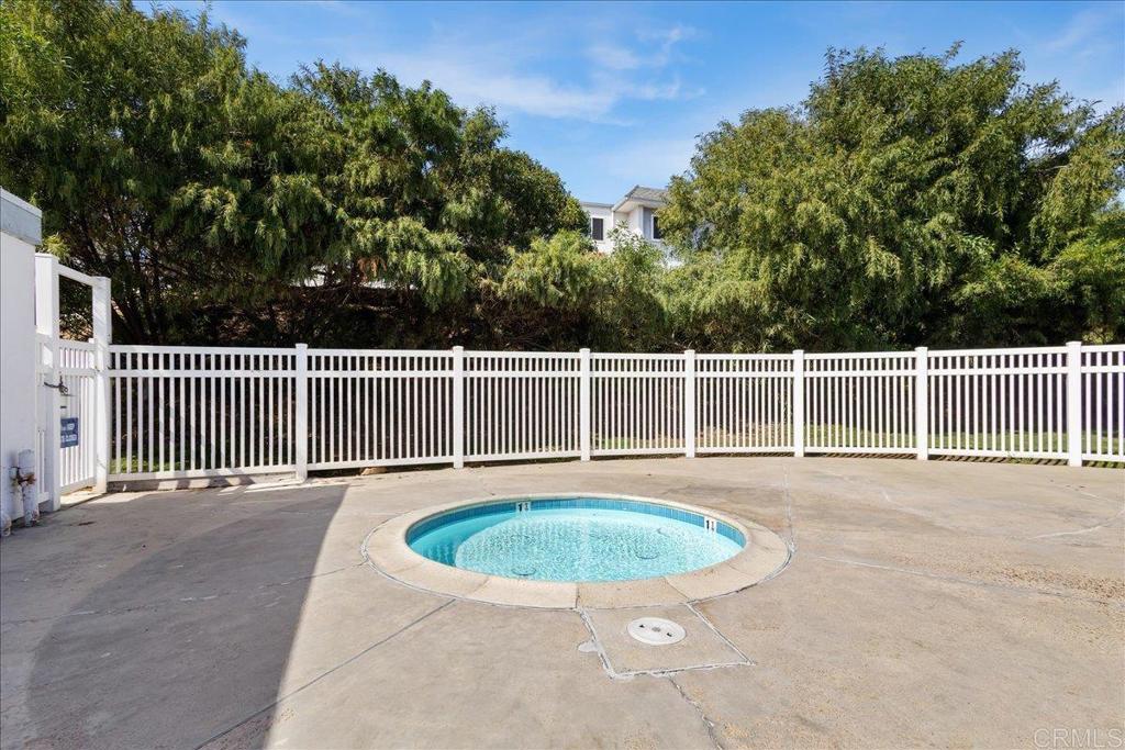 1640 Maple Drive, Unit 53 Chula Vista, CA 91911 - Photo 42 of 52 a view of a backyard with a fence