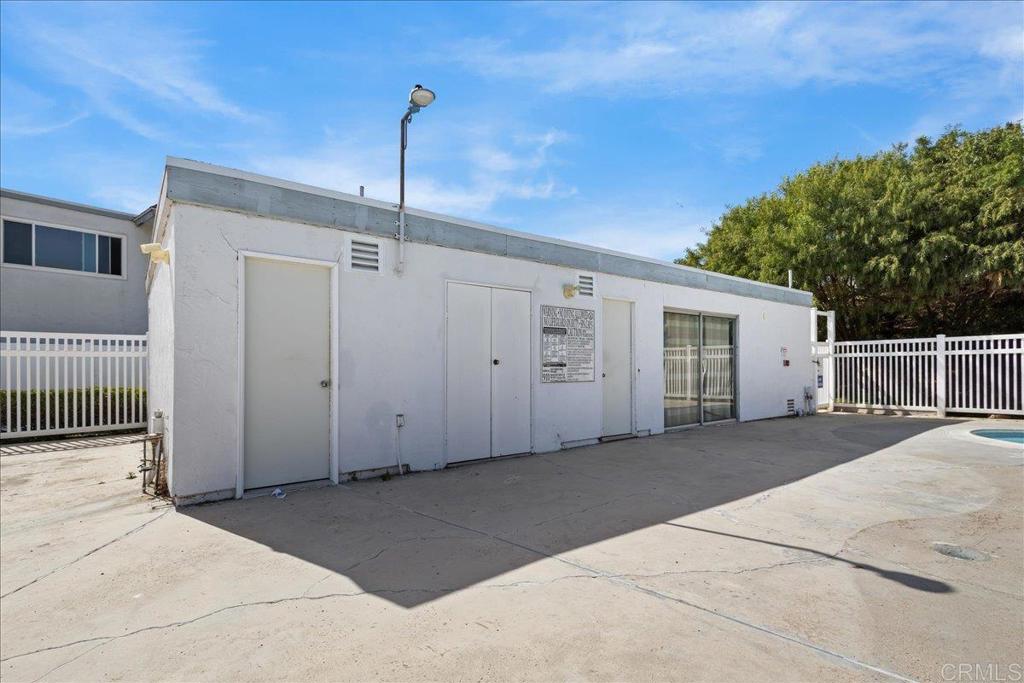 1640 Maple Drive, Unit 53 Chula Vista, CA 91911 - Photo 43 of 52 a view of a house with a backyard and garage