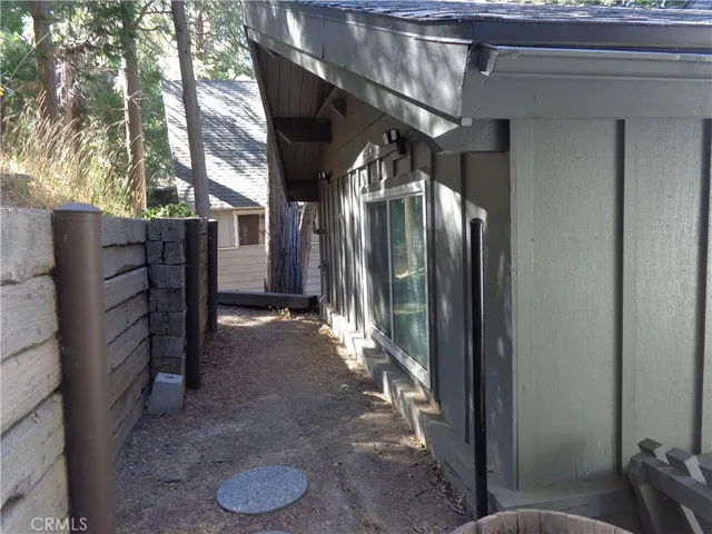 a view of balcony with wooden floor