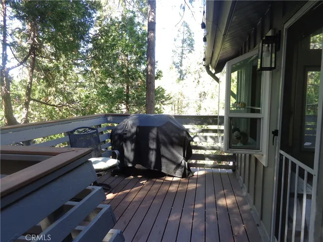 a view of balcony with furniture