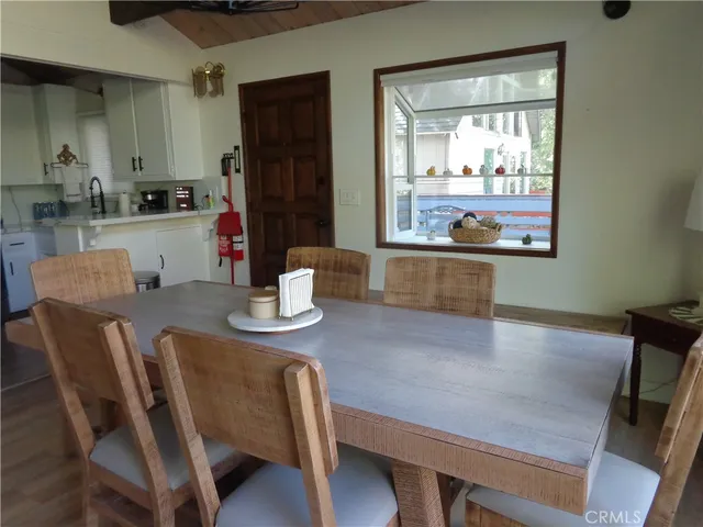 a view of balcony with wooden floor