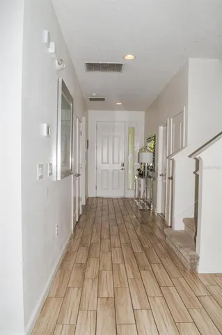 a view of a livingroom with wooden floor