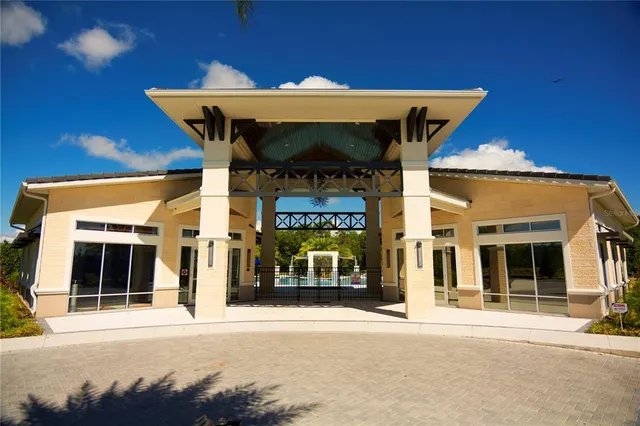 a view of swimming pool with outdoor seating