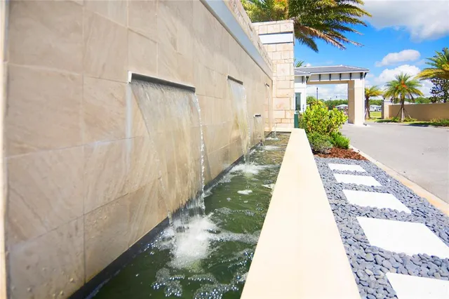 a view of a pathway with a yard