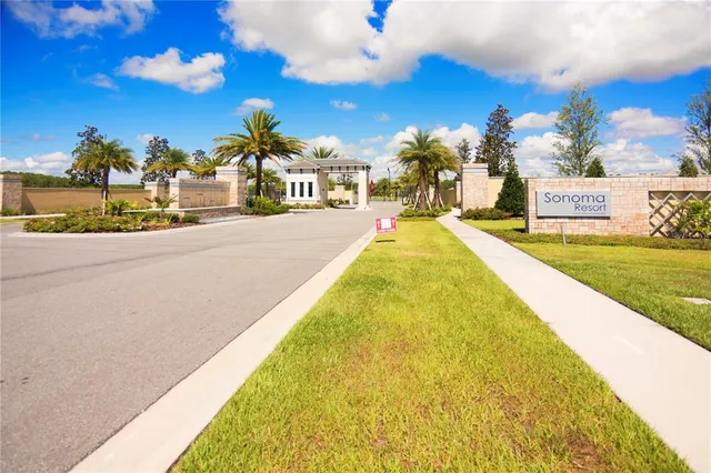 a swimming pool with outdoor seating and yard