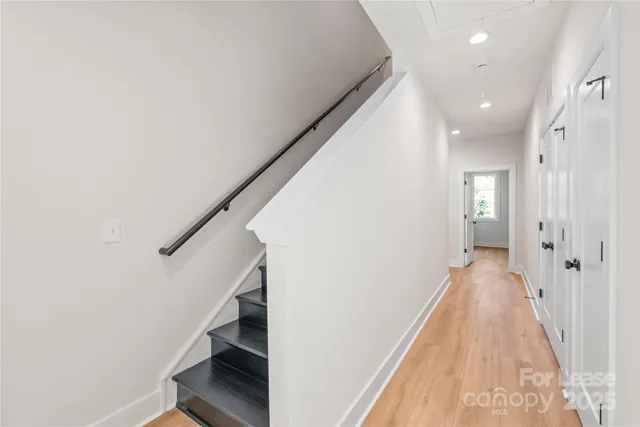 a view of hallway with stairs