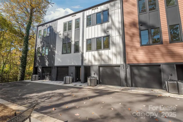 a front view of a building with a street
