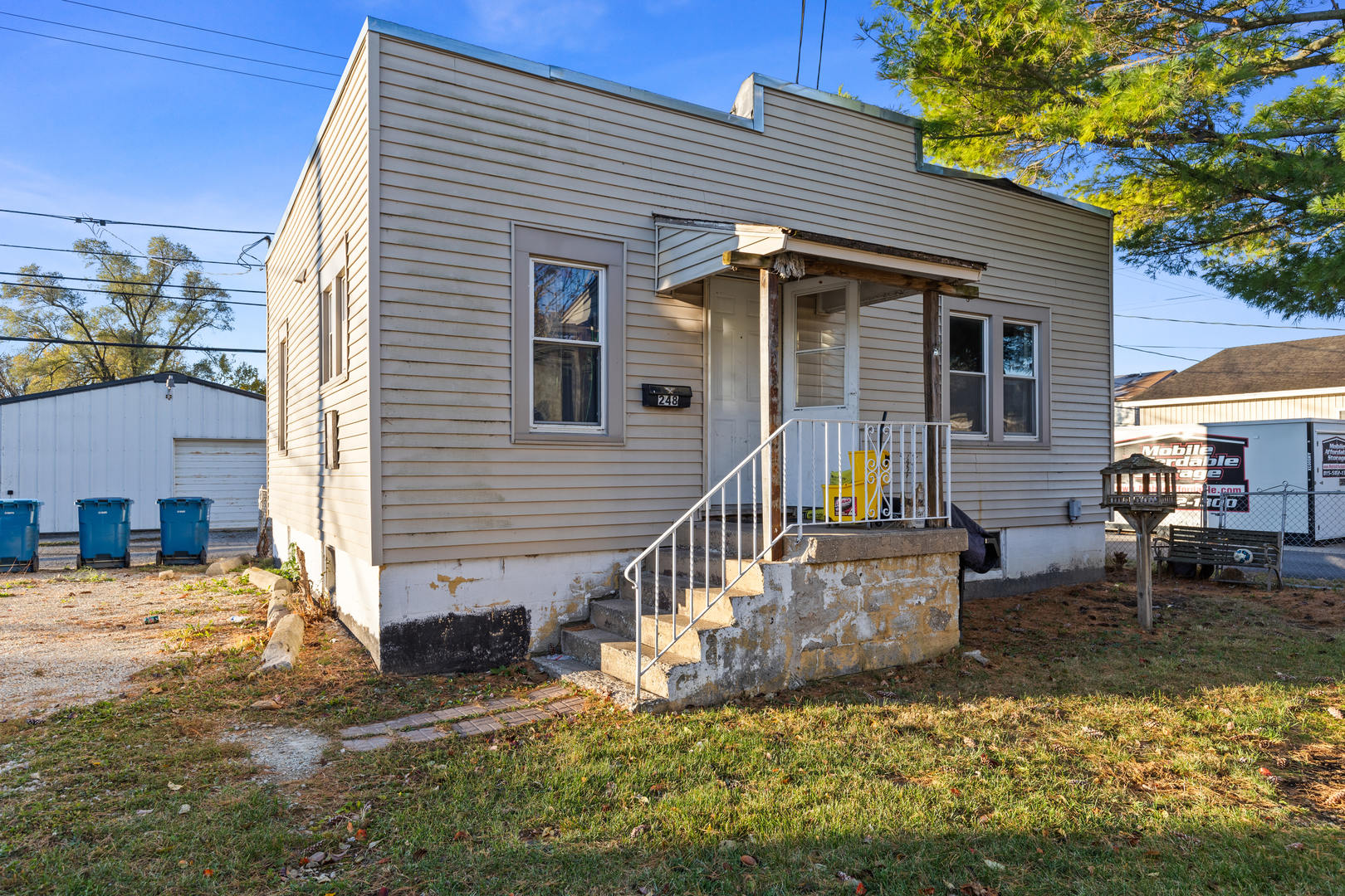 242-244 East Jeffery Street Kankakee, IL 60901 - Photo 11 of 15 a view of a house with a yard