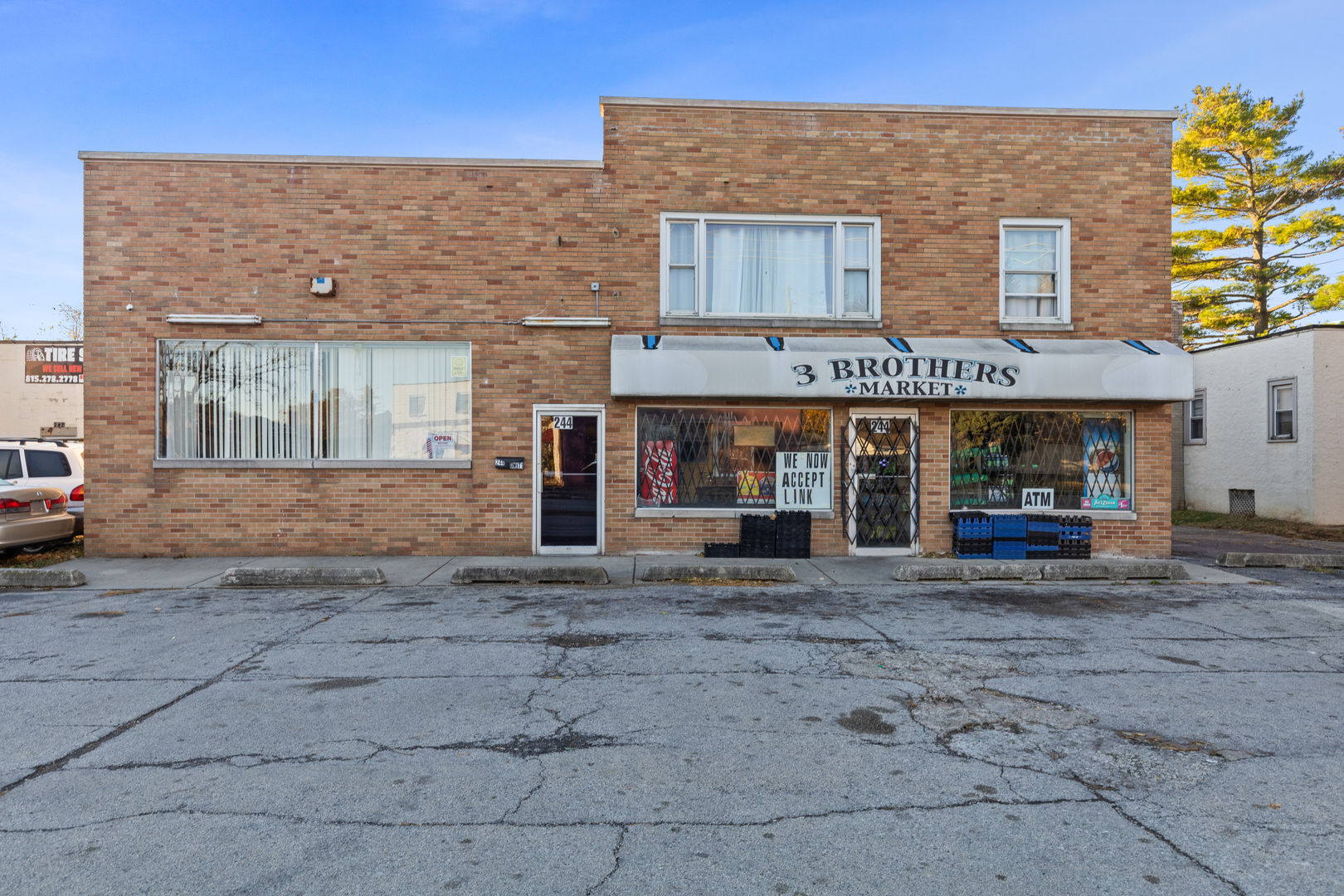 242-244 East Jeffery Street Kankakee, IL 60901 - Photo 3 of 15 a view of a building with sitting area