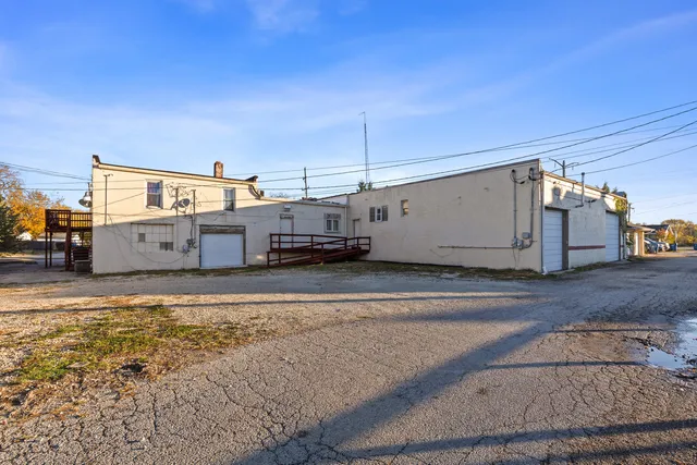 a view of a electric car in front of a building