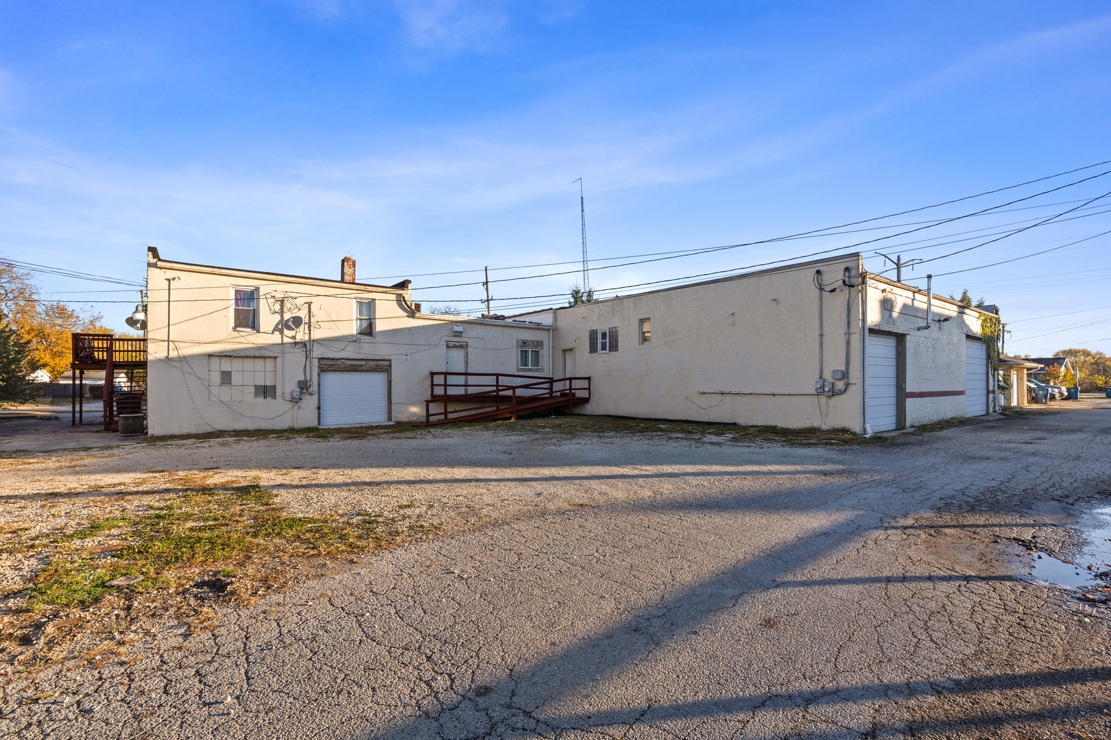 242-244 East Jeffery Street Kankakee, IL 60901 - Photo 8 of 15 a view of a electric car in front of a building