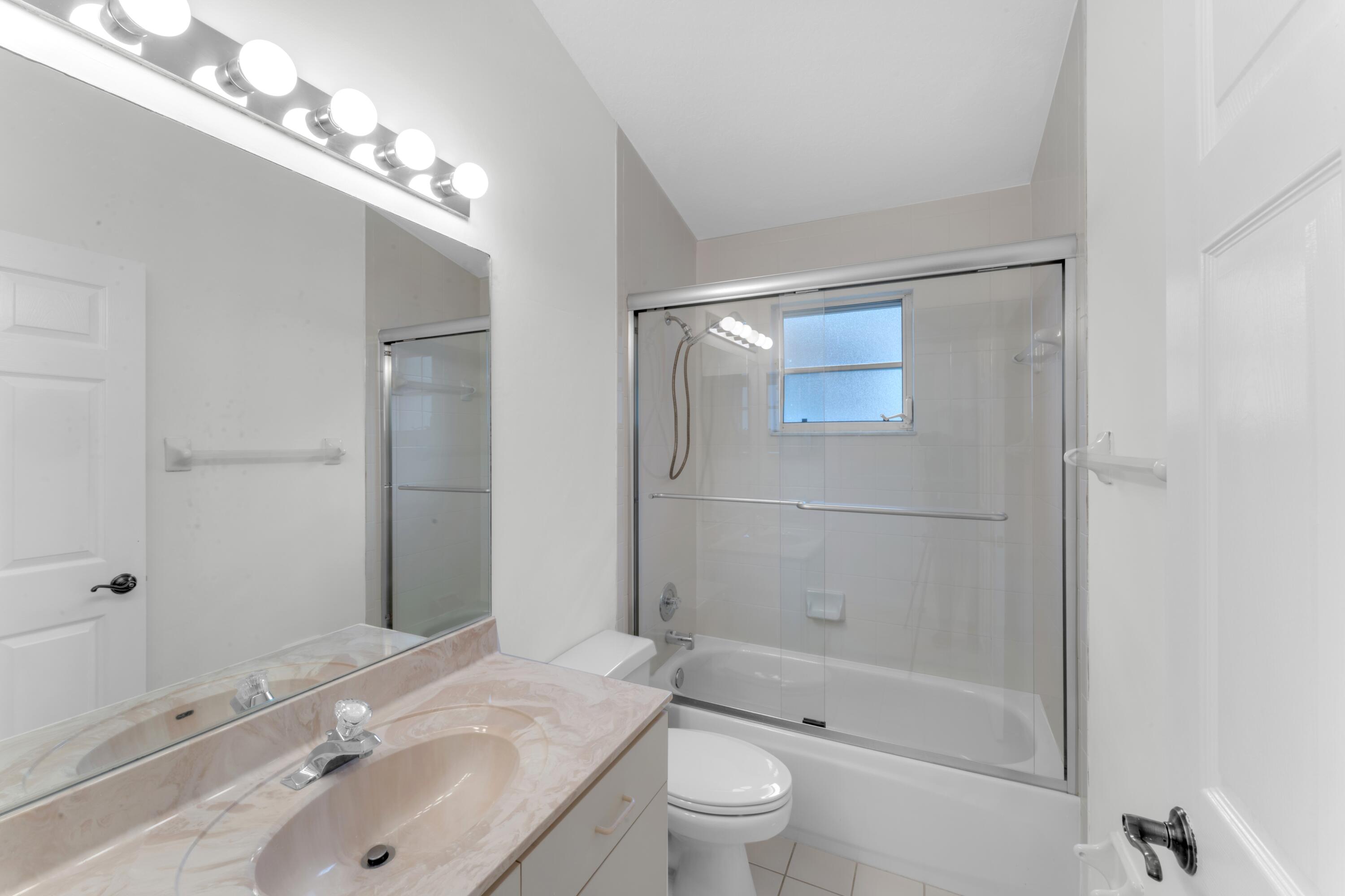 2705 Pointe Circle Greenacres, FL 33413 - Photo 23 of 46 Guest Bathroom