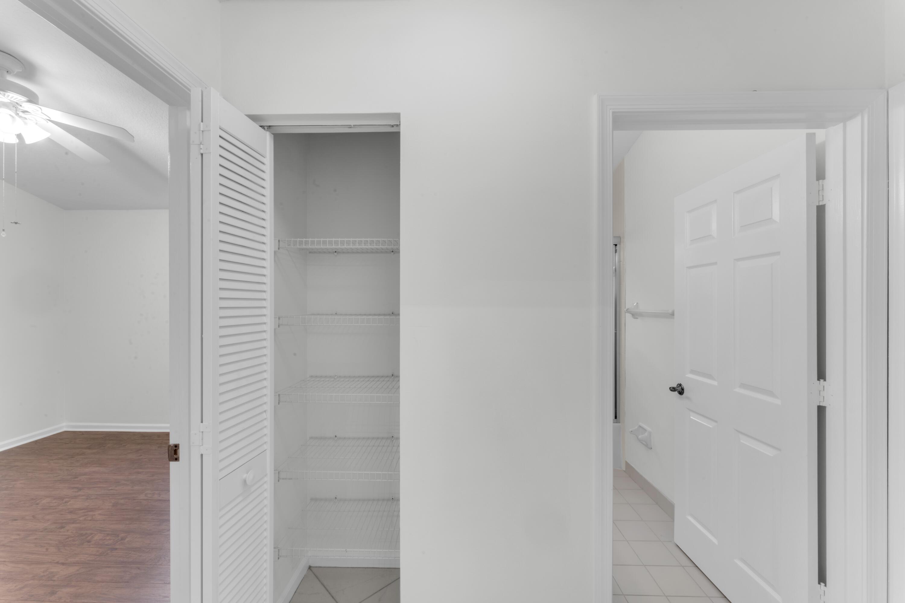 2705 Pointe Circle Greenacres, FL 33413 - Photo 24 of 46 Linen closet by 2nd bathrooms