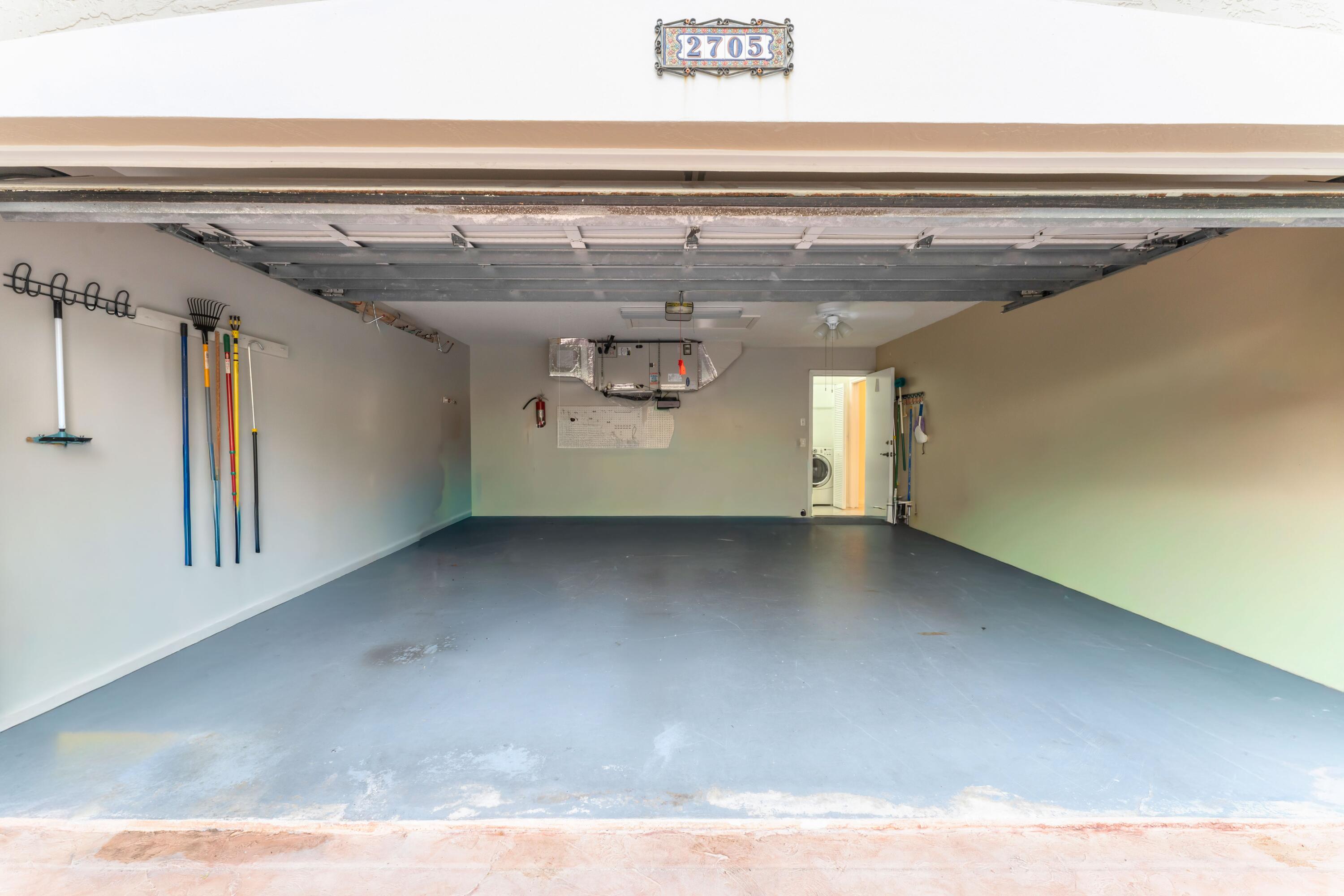 2705 Pointe Circle Greenacres, FL 33413 - Photo 30 of 46 2 car garage