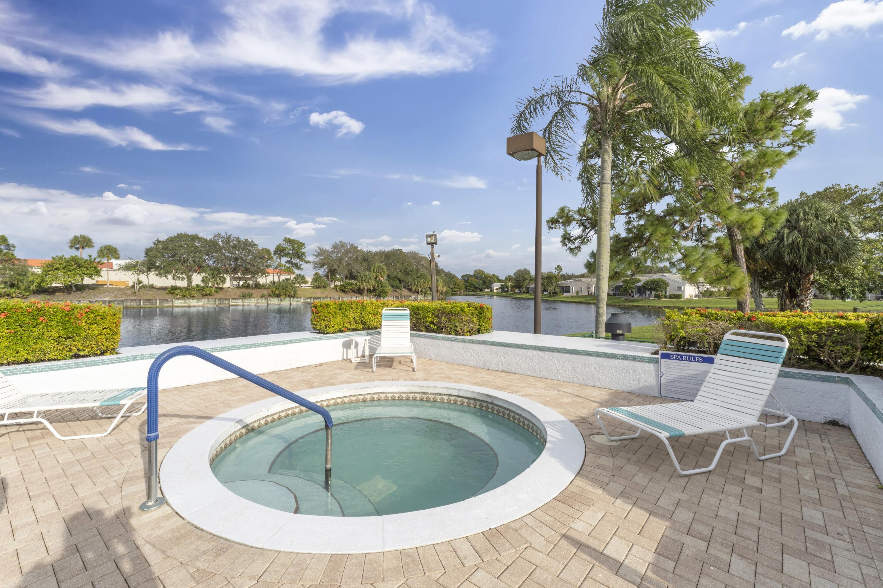 2705 Pointe Circle Greenacres, FL 33413 - Photo 37 of 46 Club house hot tub