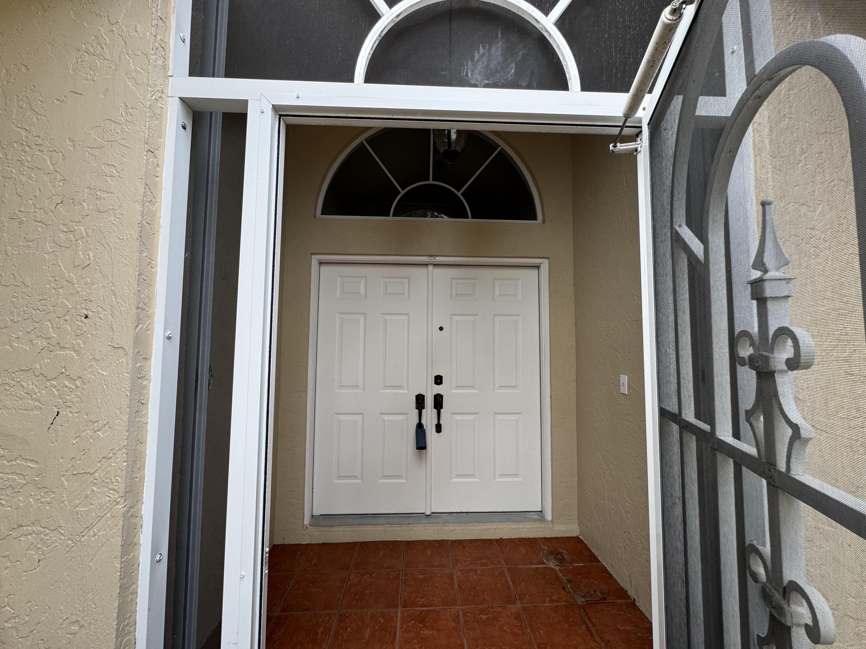 2705 Pointe Circle Greenacres, FL 33413 - Photo 7 of 46 Screened Front Porch/Double front doors