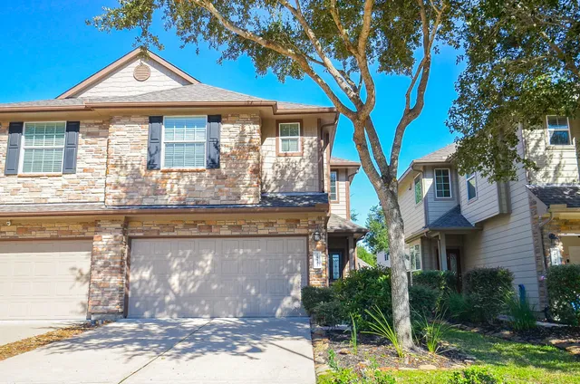 a view of a kitchen with a sink and a kitchen counter top space