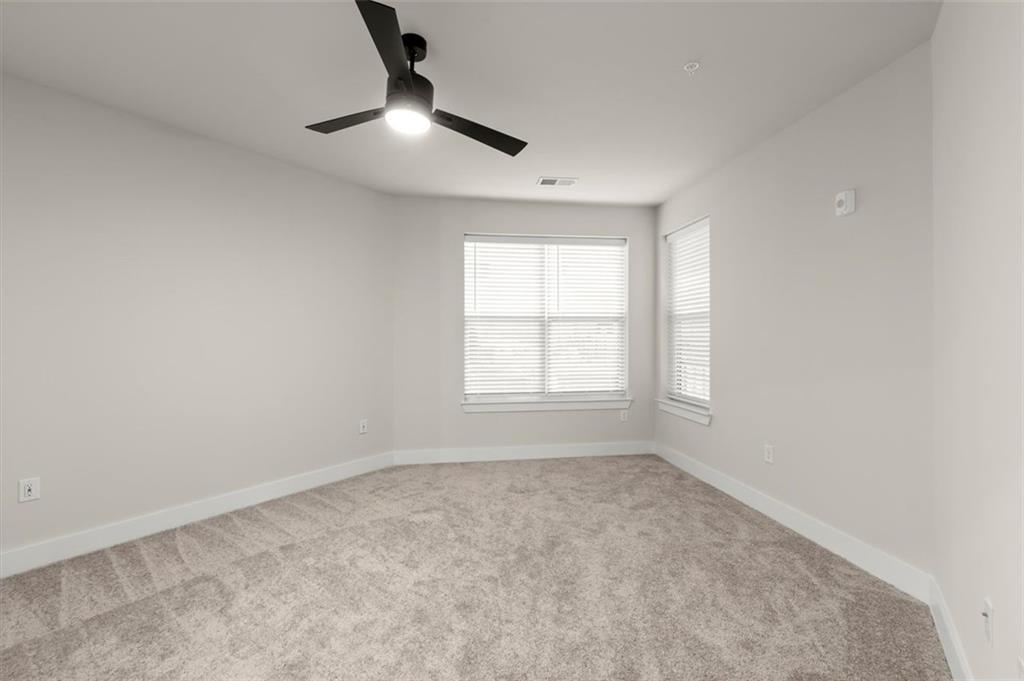 2648 Sandy Plains Road, Unit 137 Marietta, GA 30062 - Photo 16 of 38 an empty room with a window