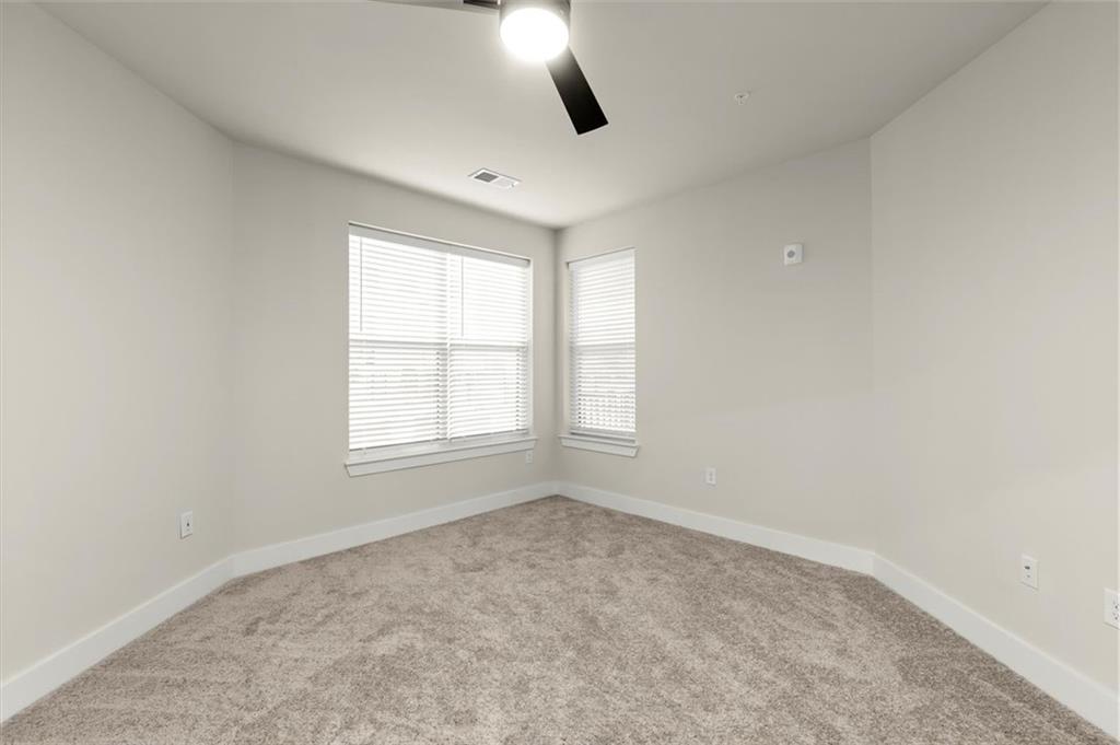 2648 Sandy Plains Road, Unit 137 Marietta, GA 30062 - Photo 17 of 38 an empty room with windows