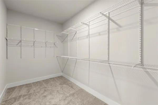 a view of a room with racks on the wall
