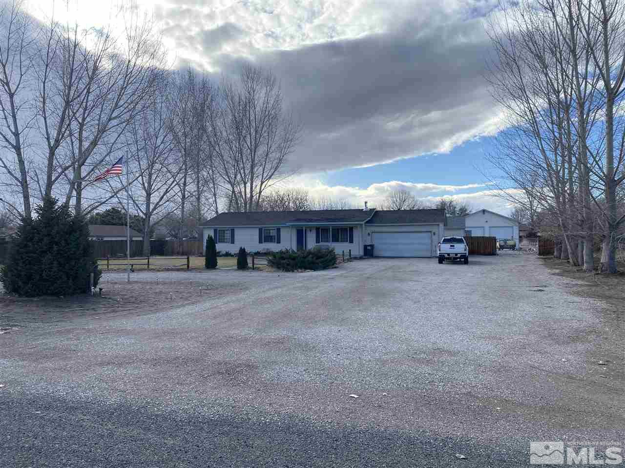 370 Lewis Lane Fallon, NV 89406 - Photo 1 of 11 a view of a house with a yard