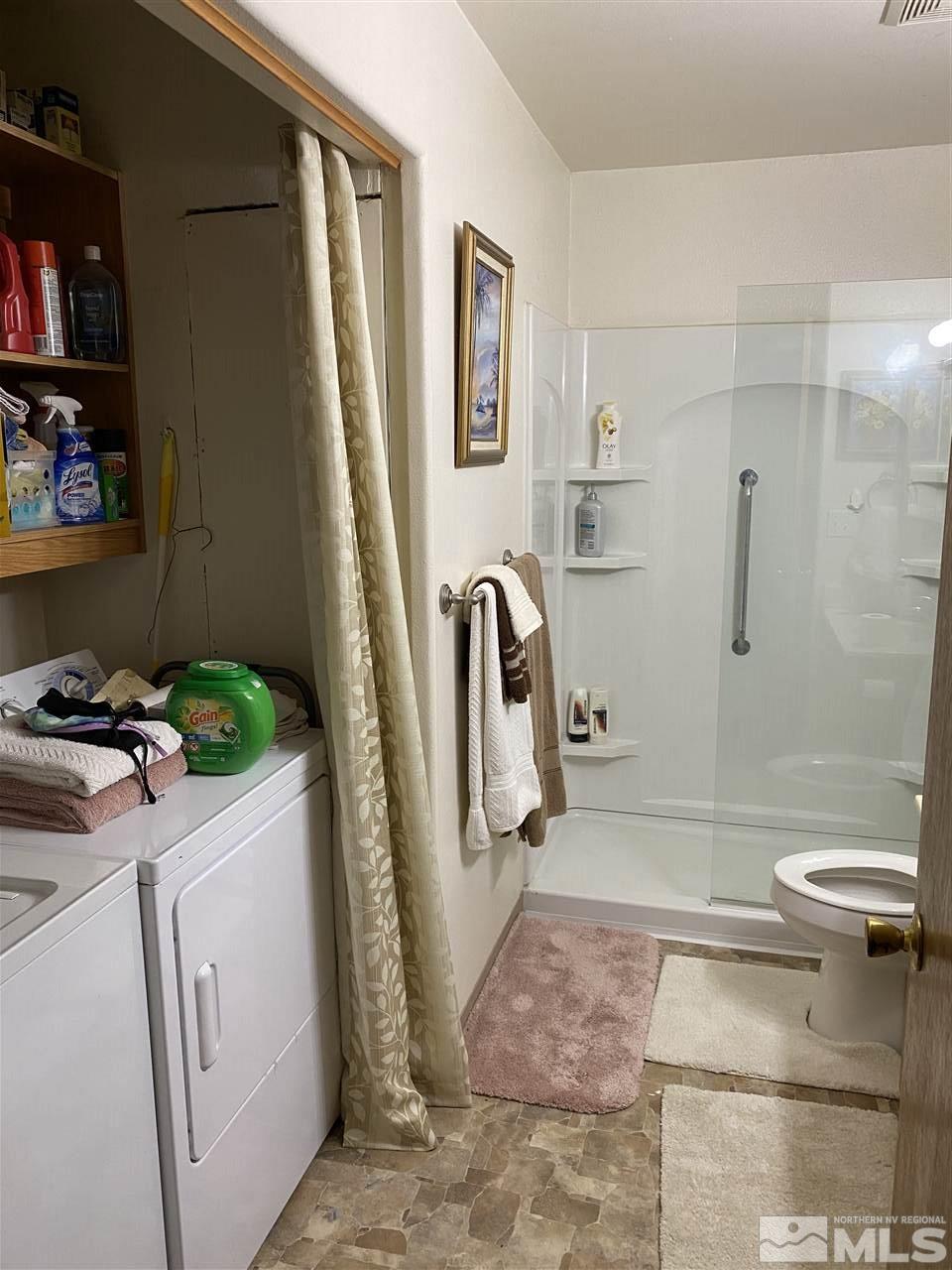 370 Lewis Lane Fallon, NV 89406 - Photo 6 of 11 a bathroom with a sink a toilet and a shower