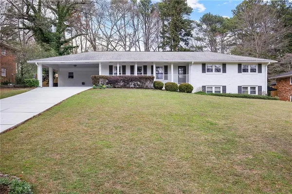 a view of house with outdoor space