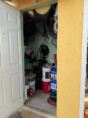 a kitchen with a stove and a refrigerator