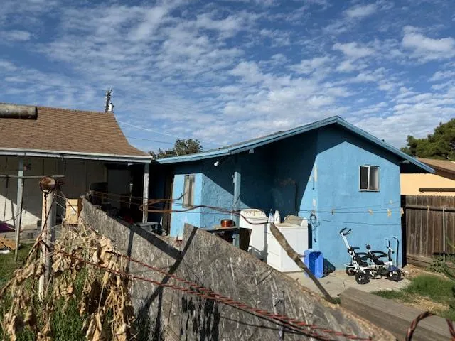 a view of a house with a patio