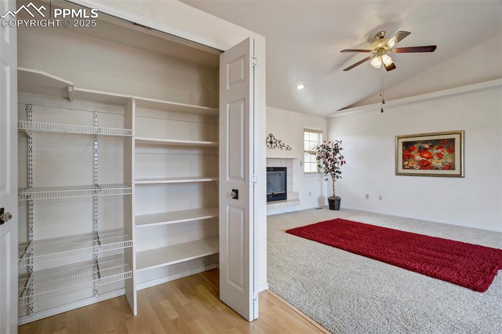 1528 Shane Circle Colorado Springs, CO 80907 - Photo 28 of 39 a living room with furniture and a chandelier
