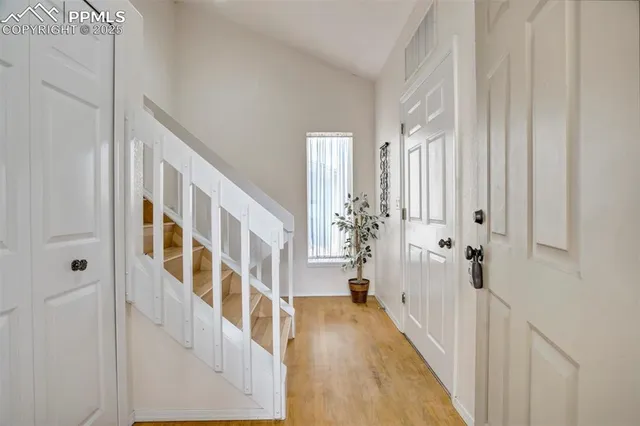 a view of empty room with windows