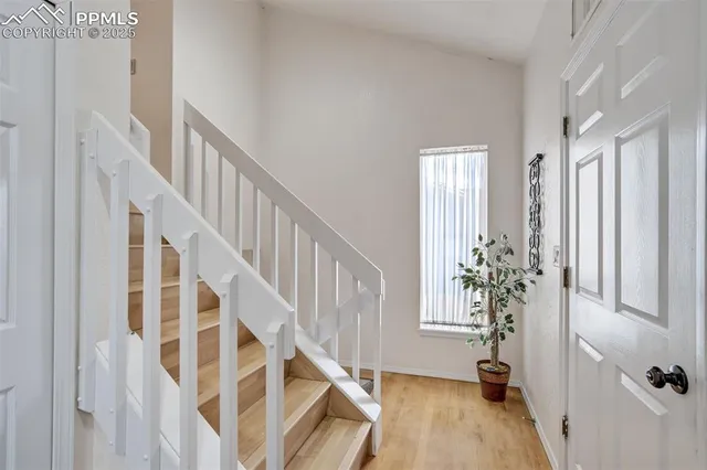 a view of staircase with white walls and white walls