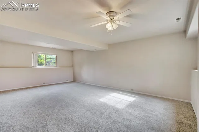 a view of a room with windows