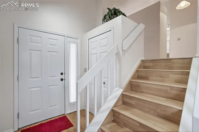 a view of livingroom with hardwood floor and hallway