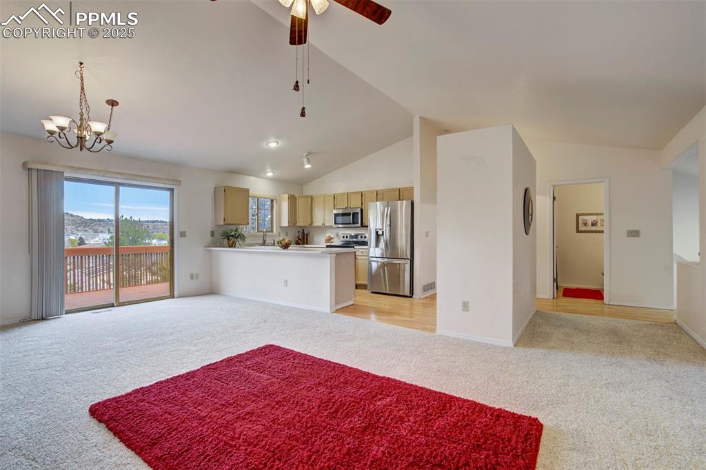 1528 Shane Circle Colorado Springs, CO 80907 - Photo 9 of 39 a view of kitchen with refrigerator and window