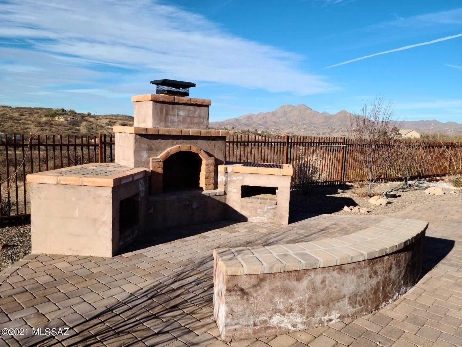 1038 Oso Court Rio Rico, AZ 85648 - Photo 42 of 50 a view of a terrace with seating space