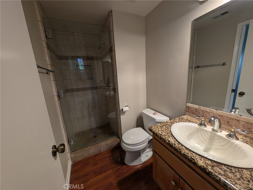 1197 Monte Sereno Drive Thousand Oaks, CA 91360 - Photo 14 of 27 a bathroom with a sink toilet and shower