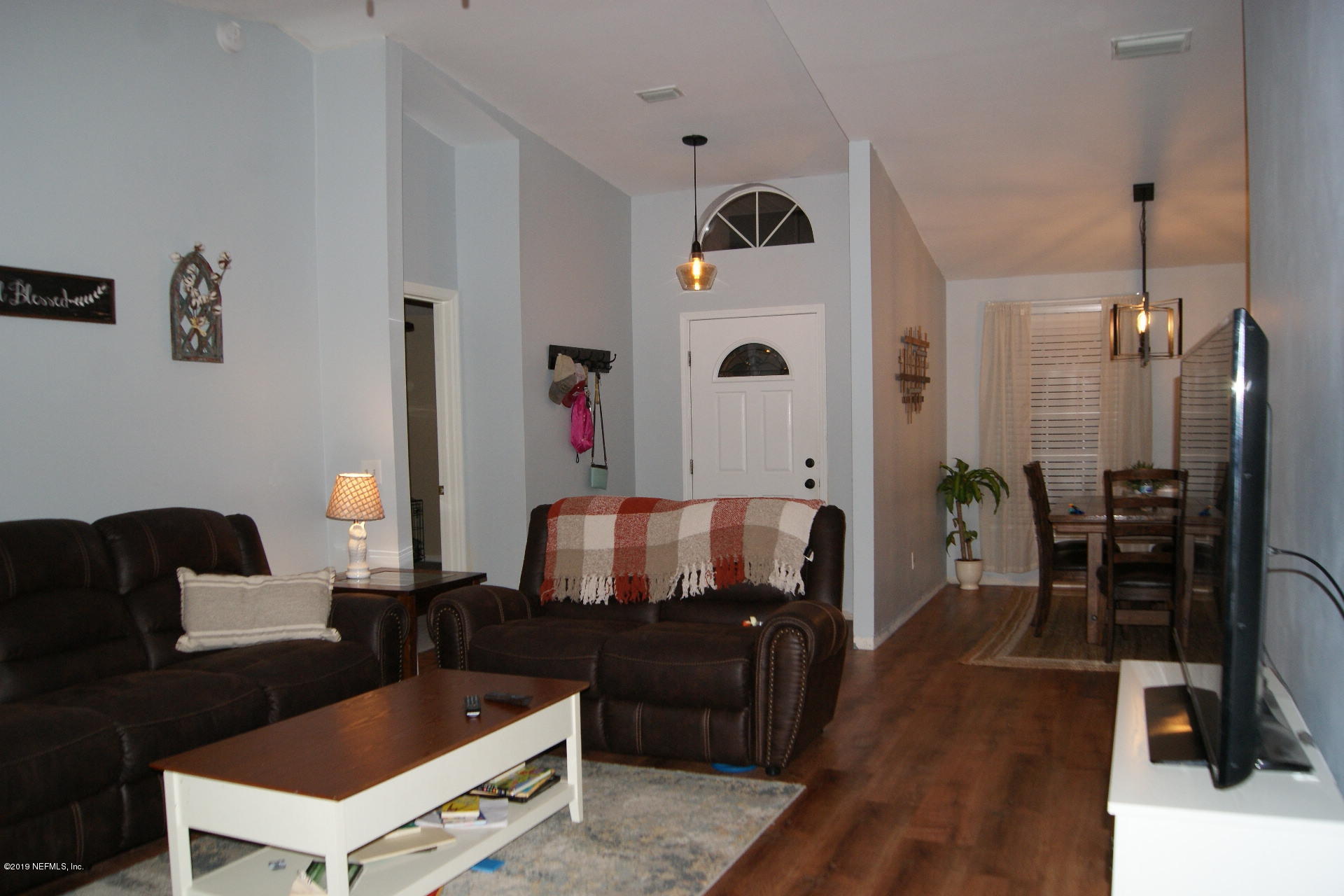 510 Jasmine Road St. Augustine, FL 32086 - Photo 3 of 14 a living room with furniture and wooden floor