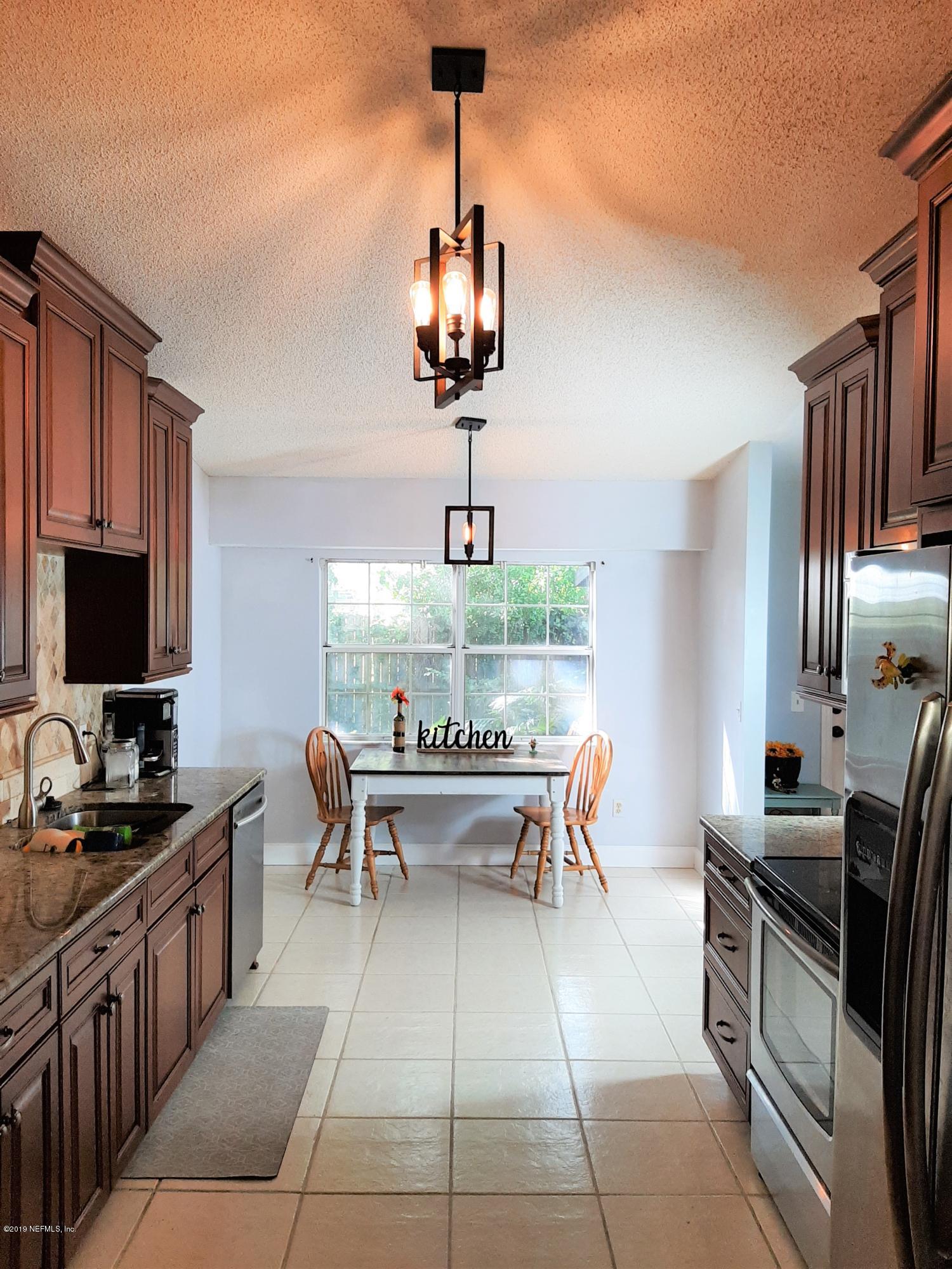 510 Jasmine Road St. Augustine, FL 32086 - Photo 5 of 14 a view of a workspace with furniture