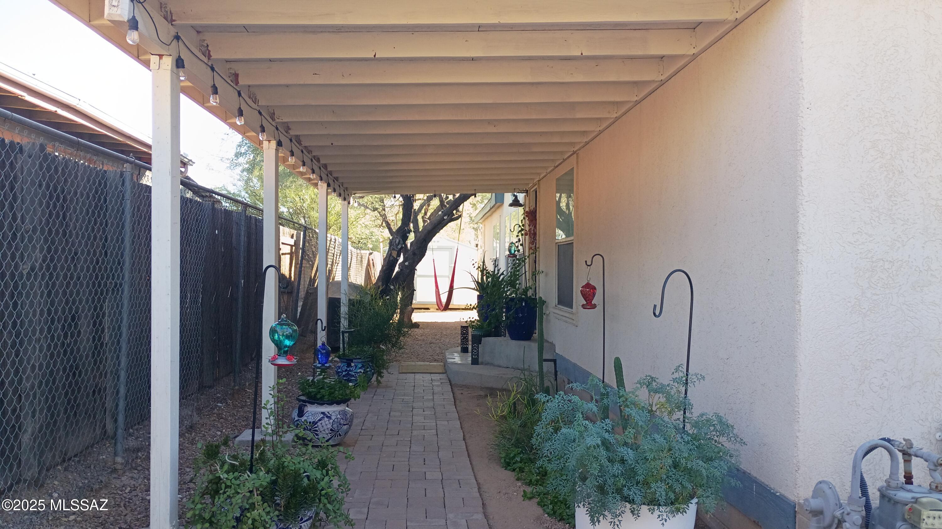 1449 West Hualpai Road Tucson, AZ 85745 - Photo 35 of 49 a couple of potted plants in front of door