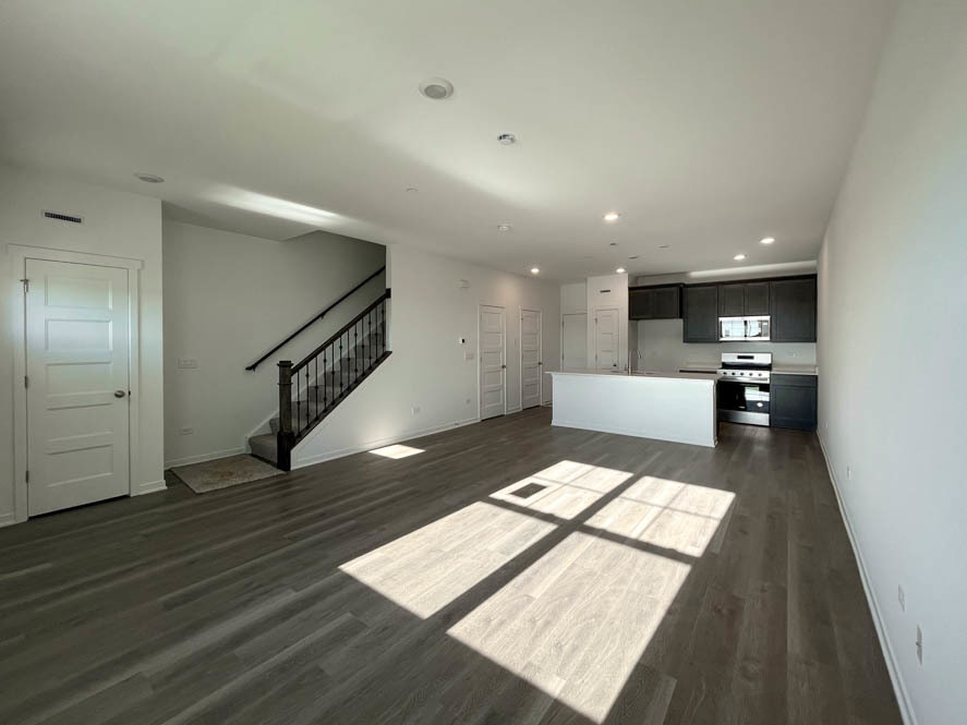 2239 Riesling Road Oswego, IL 60543 - Photo 4 of 49 a view of a living room and wooden floor