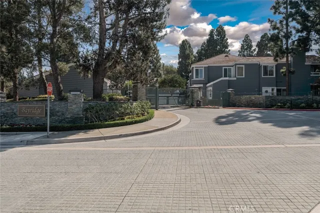 a view of a house with a street
