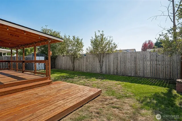 a backyard of a house with lots of green space